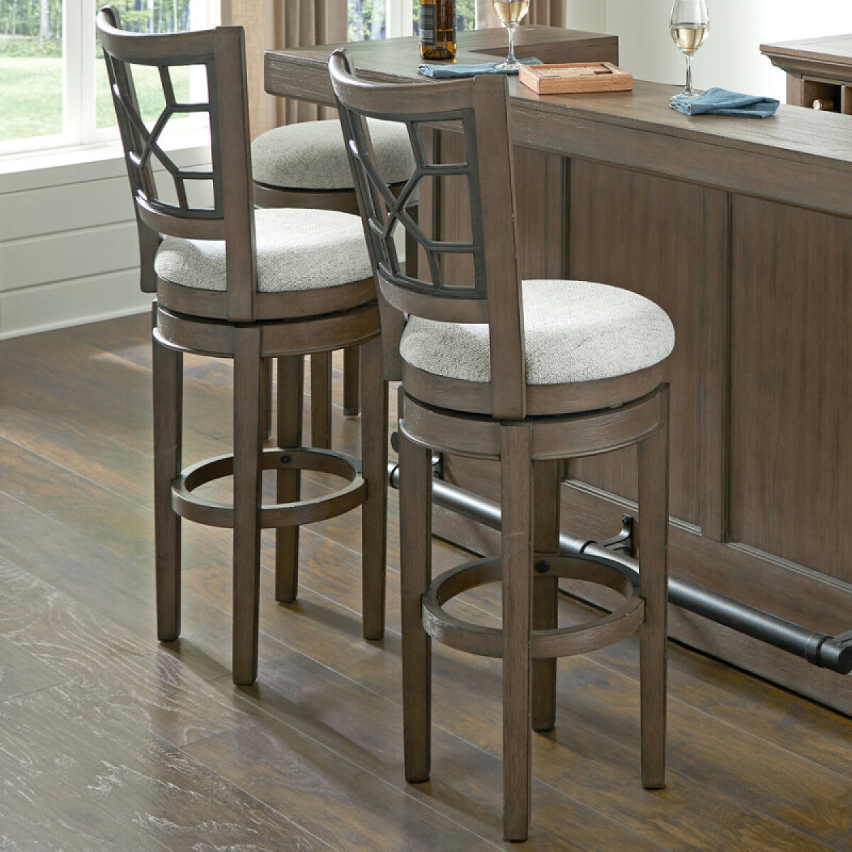 11ad41530df26166c154cdd90c249903 Sundance Dining - Sandstone Swivel Bar Stool Grid Back - Image 1