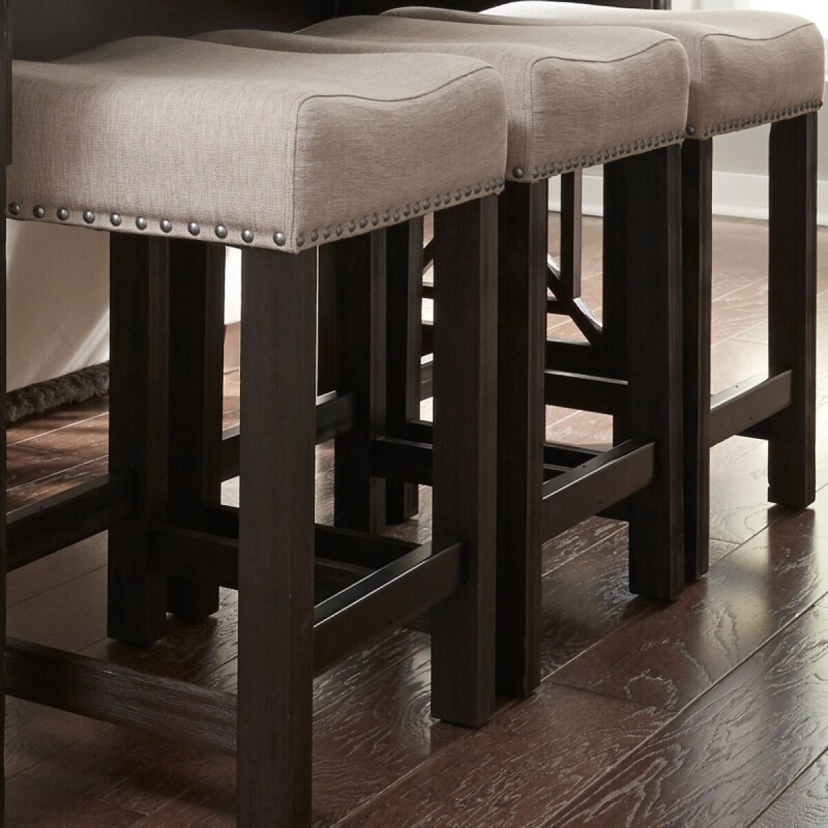 2d0a24f387bd8b8155fb625b41d4ab75 Heatherbrook Uph Console Stool - Image 1