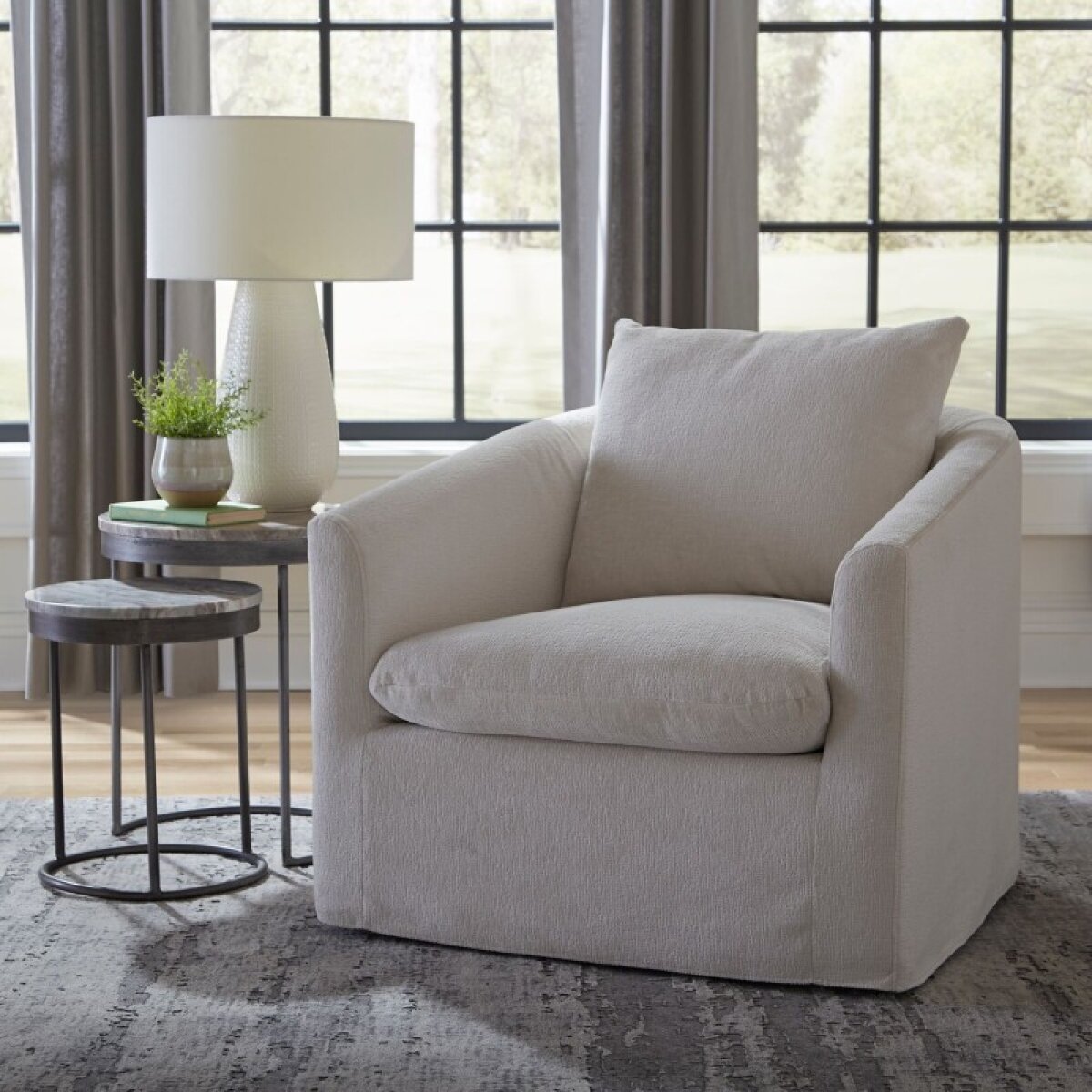 48f947148de6c5239fdd2a24af1b0b7e Uph Swivel Accent Chair - Ivory - Image 1