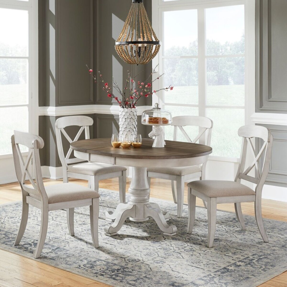 606f673e8489fdde1fcd161d0dffc7f2 Ocean Isle 5 Piece Pedestal Table Set - Image 1