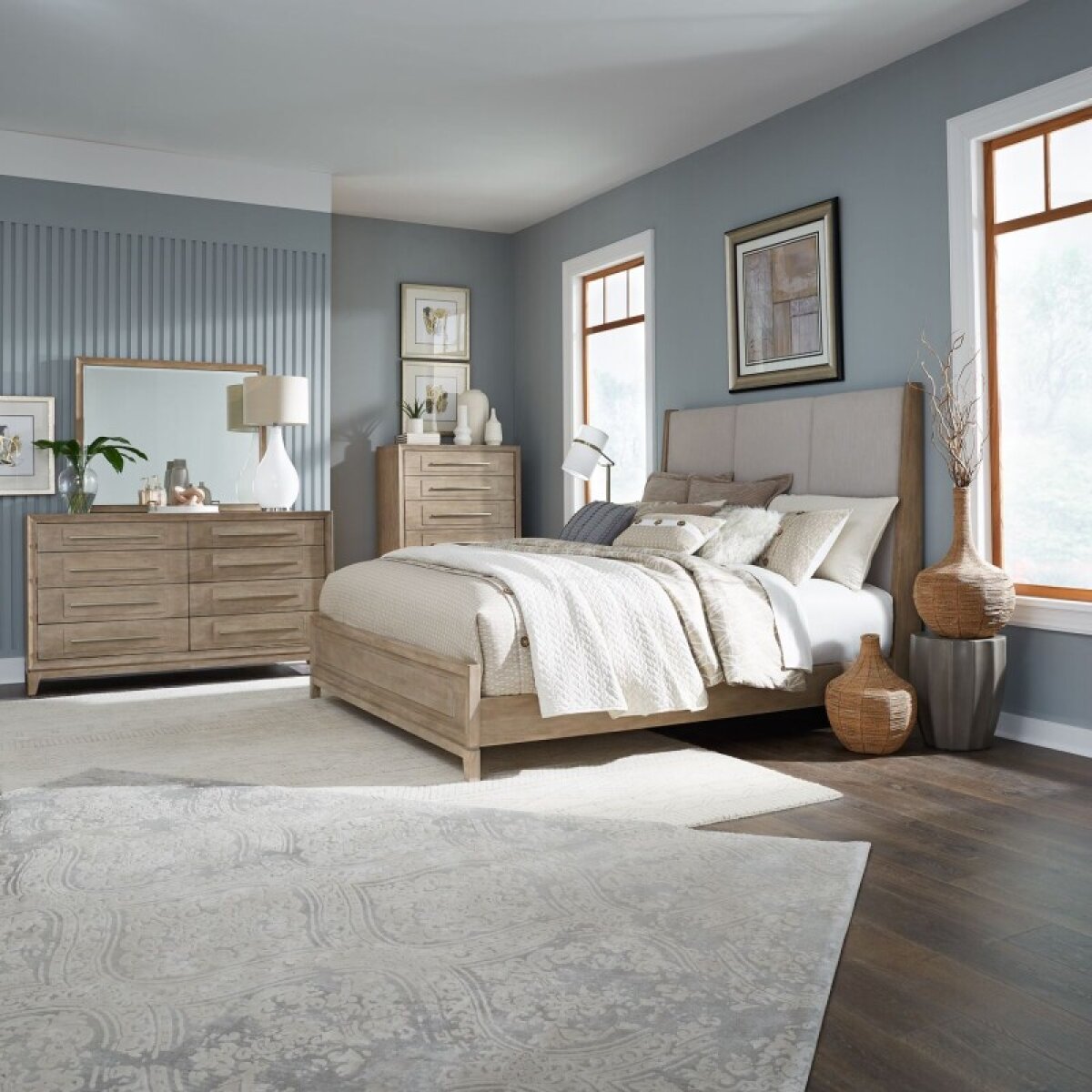 852dad4434db0a398df208c64237ec10 Brentwood King Uph Bed, Dresser & Mirror, Chest - Image 1