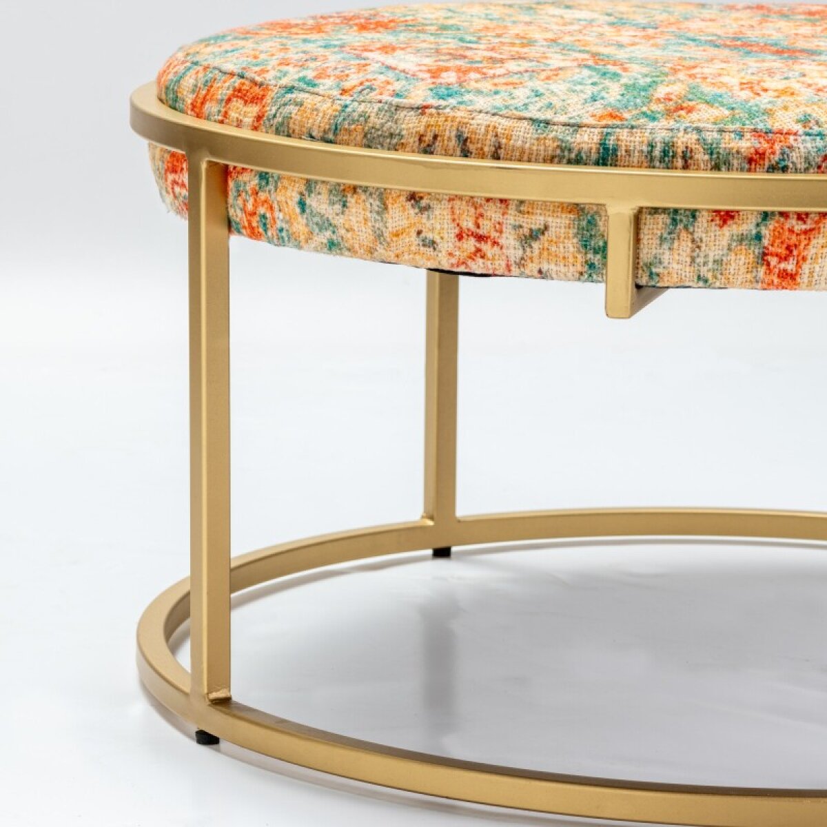 88919d5165de66598a131c4c759e7cb1 Melinda Round Printed Upholstered Cocktail Table - Image 1