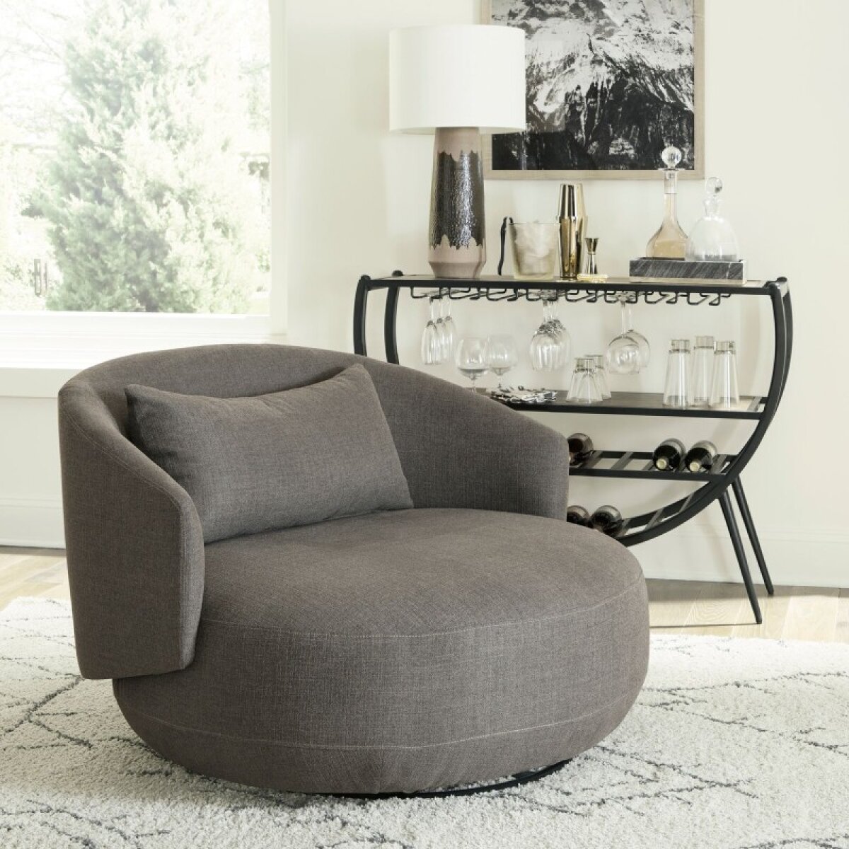 932d20b813afc704ed3c942c038fa19e Uph Swivel Cuddler Chair - Charcoal - Image 1