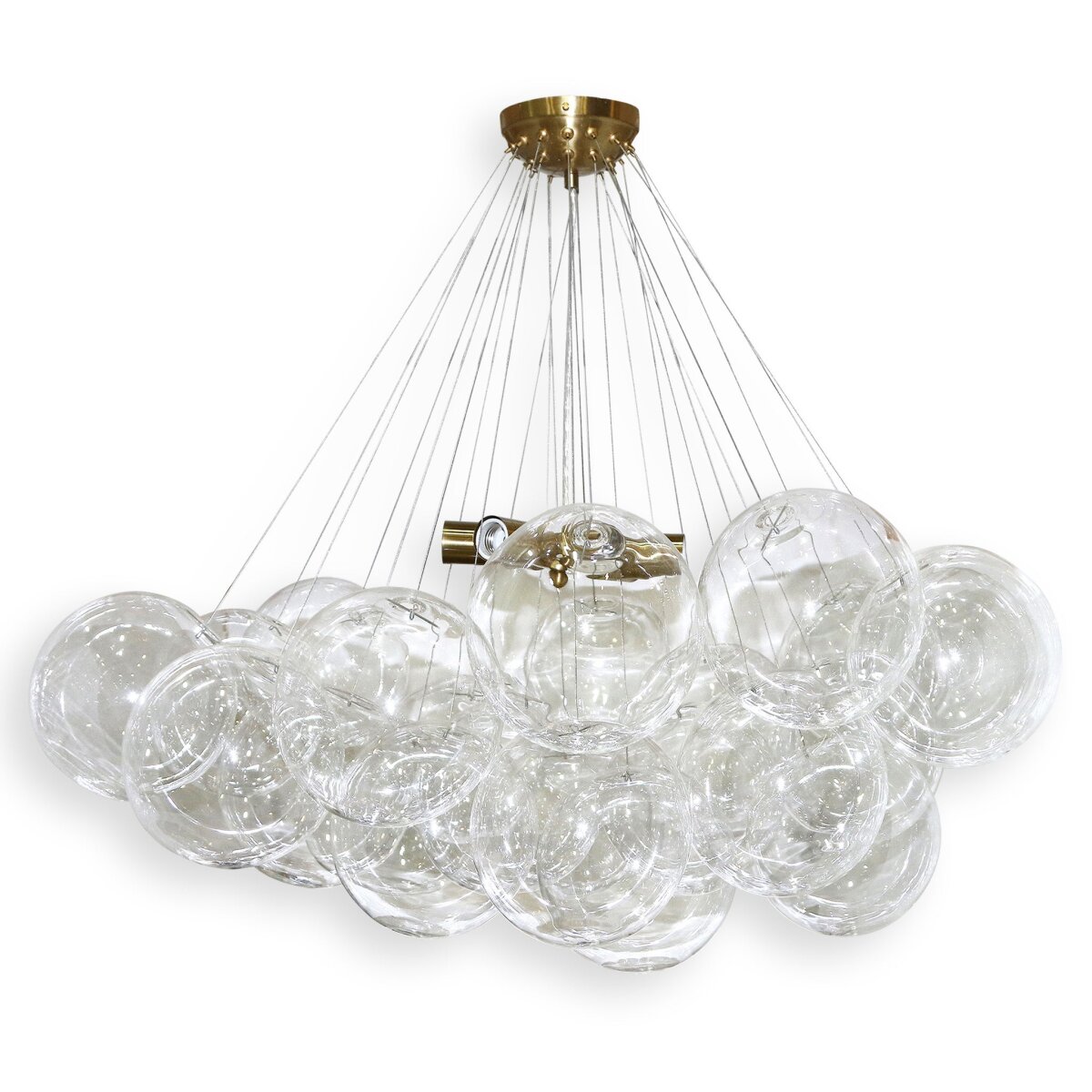 ce82ef3e83abc9e08e5cb3228366ef37 Hagen Chandelier | Clear Glass Globes With Antique Brass Finished Metal - Image 1
