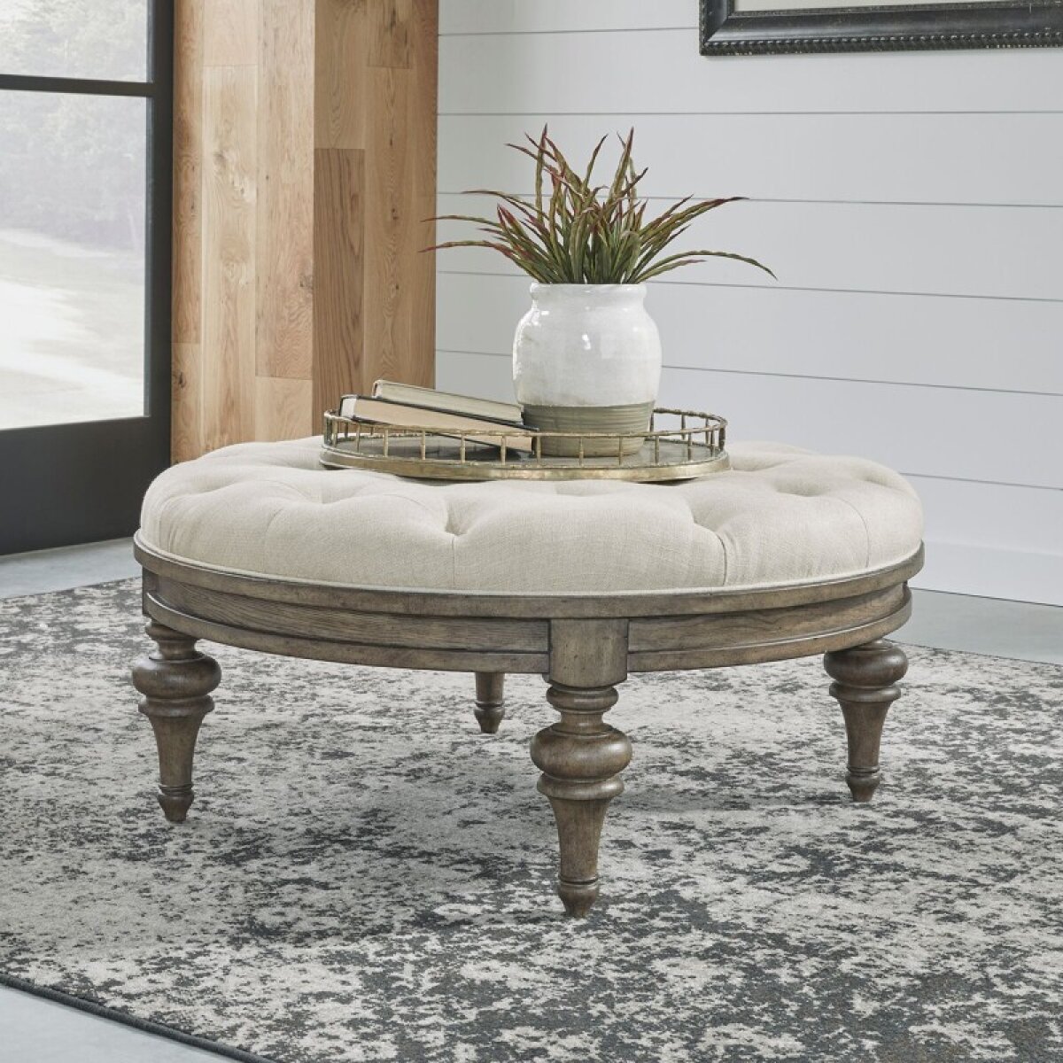 dd9a554b4c6ff154c450bb22552b4534 Americana Farmhouse Round Cocktail Ottoman - Image 1