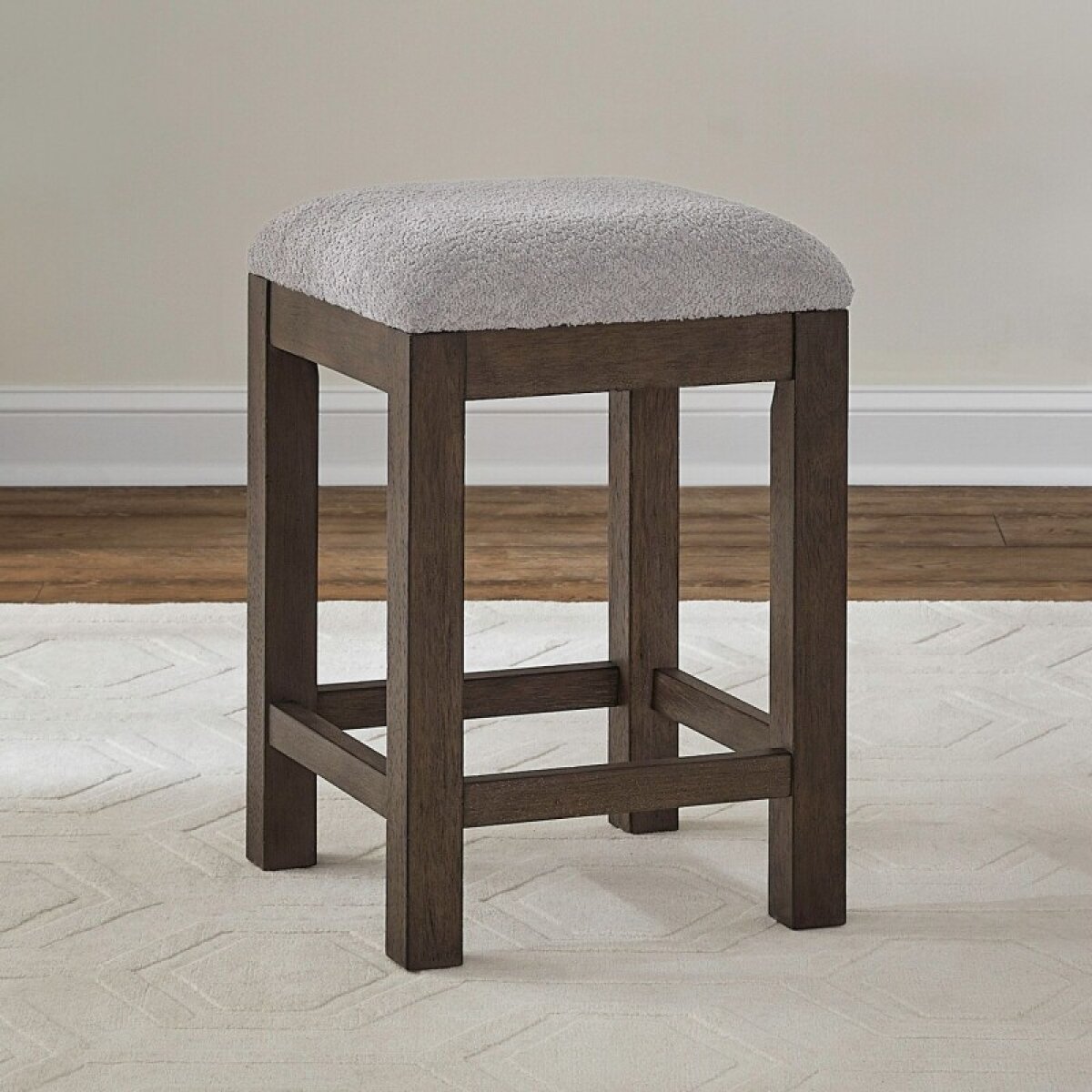 f84ccff825cf2bba9b3de07605f238db Cascade Falls Uph Console Stool - Image 1