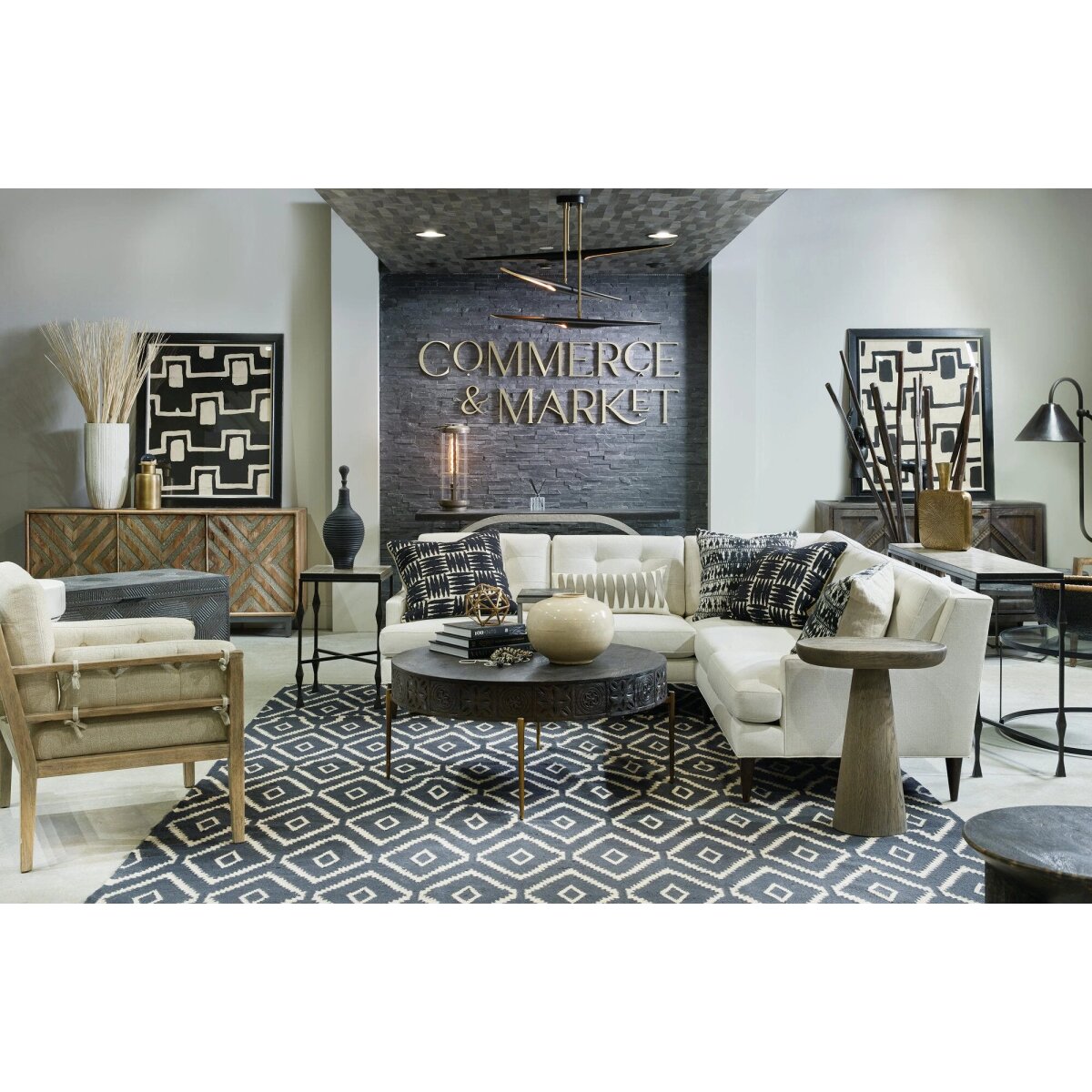 14f4e3dbdb775aecc11f963b76ca257f Commerce & Market Carved Round Cocktail Table - Image 1