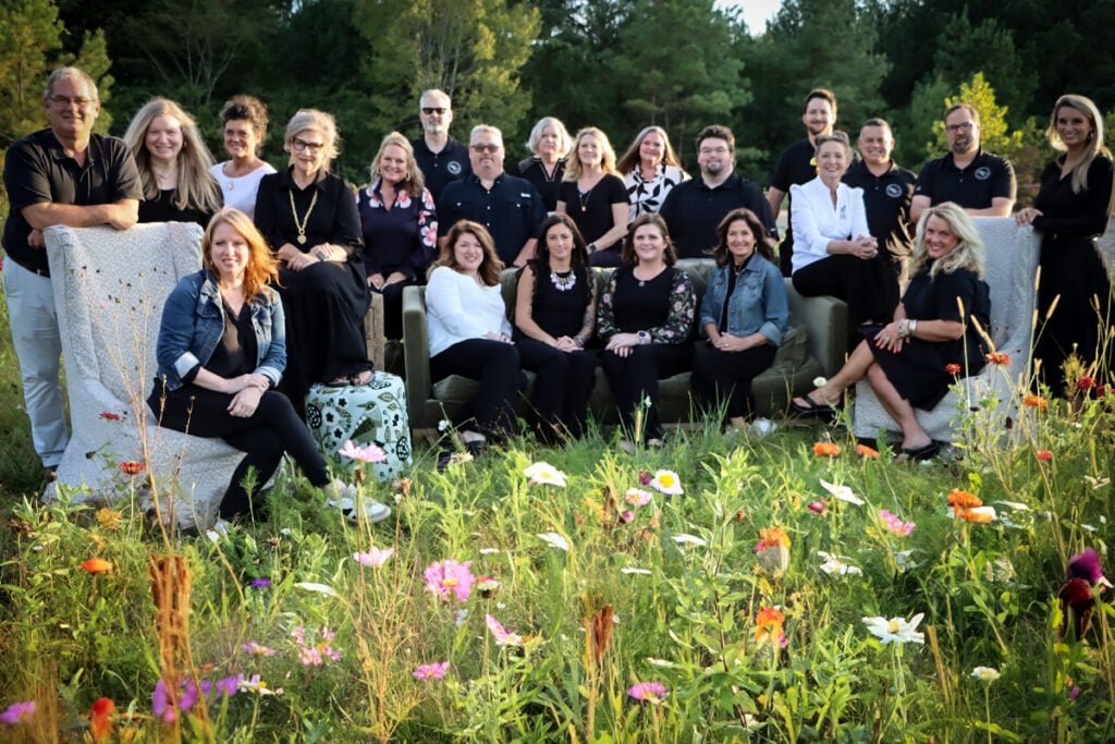Team Picture In Wildflower Field Copy 1024x683